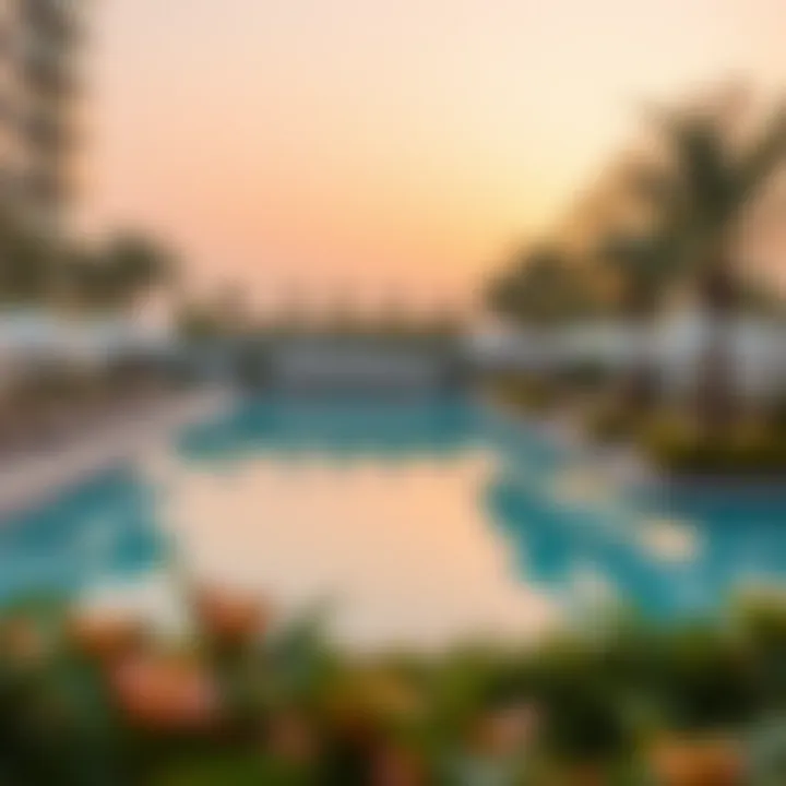 Luxurious Poolside Experience Luxurious swimming pool at Beach Rotana Residence surrounded by greenery